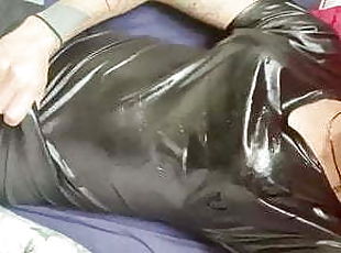 Trans girl playing with fake cum on wet look leather dress