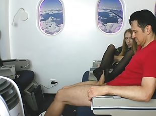 Stewardess gives nylon footjob in plane by Foot Girls