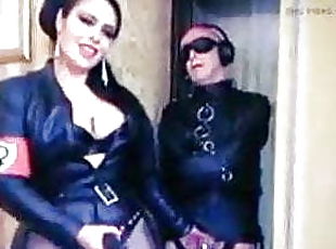 Leather Mistress with two bisex slaves