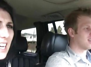 Couple in the car films their chatty fun