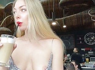 Elegant blonde flashing her nipples in cafe. Public Downblouse.