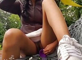 Masturbating in the park and ending with a squirt.