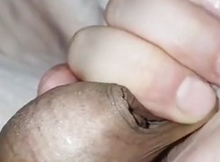 Stepsons cock gets a handjob from his horny stepmom in bed