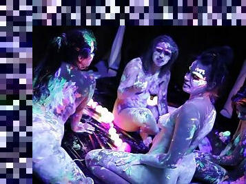 Hot lesbians play with fluorescent paint for the body