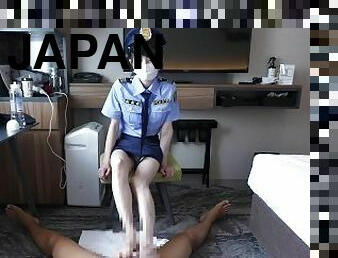 Japanese girl cosplayed as a police gives a guy a foot job