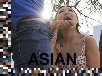 Petite asian nymph Lulu Chu sucks huge dick outdoor