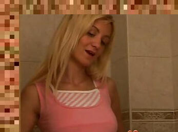 Kinky blonde plays with her favorite toy in the toilet