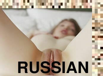 Russian young cutie touching her body
