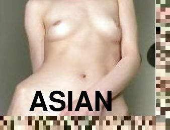 Sexy white Asian woman shows off her sexuality