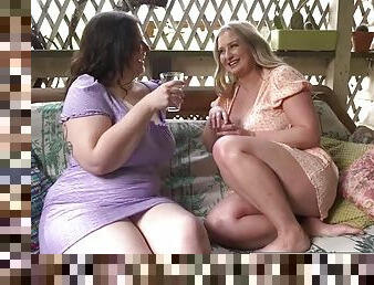 Curvy lesbian girls with huge tits fuck on the porch