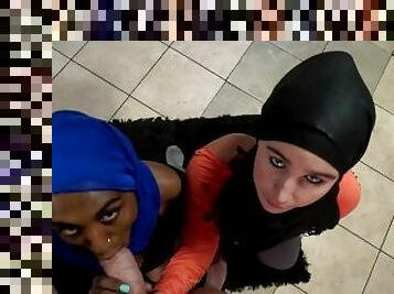 Two Muslim hijab woman on their knees sucking dick and getting their faces covered with cum