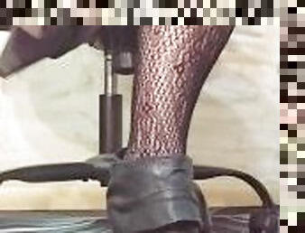 Tapping in  Black open toed booties fishnets and white toe nails