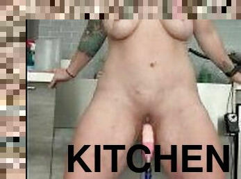 Naughty mommy in the kitchen