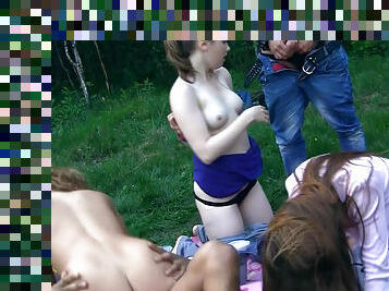 Arousing teens in outdoor orgy