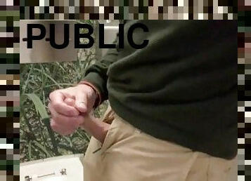 Jerking off and cumming in the airport bathroom before a flight.