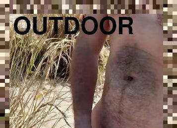 Jerk off on Plumb Beach in New York and cum on the sand