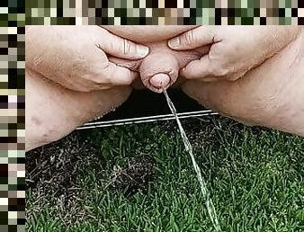 Fat man Flaccid Cock pissing and playing outside naked