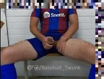 Jerkoff in the baseball locker room wearing football kit