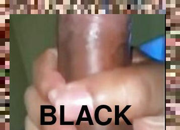 Stroking big black cock