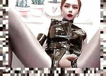 Cat woman is a ladyboy playing with her cock and cum on feet