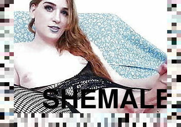 redhead shemale beauty in black lingerie masturbates on web