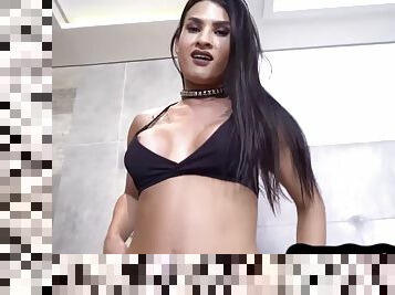 Busty latina trans babe with booty jerks during solo session
