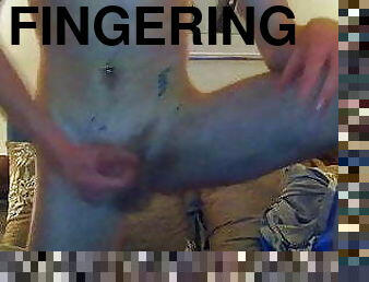 Inked twink fingering his juicy ass and jerking off solo