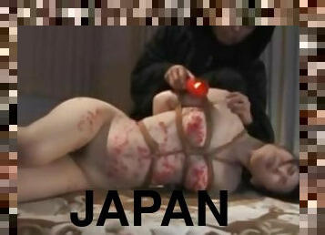 A Japanese MILF -Suffering Candle & Anal use