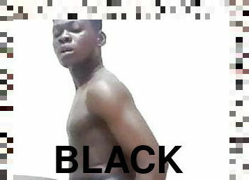 Nigerian boy stripping