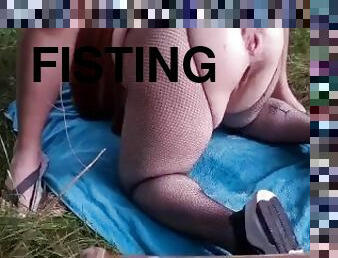 Slut gets her ass fisted hard in the forest