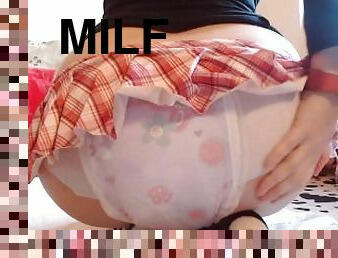 Girl alone in the house wears her nice diaper and shows it to you