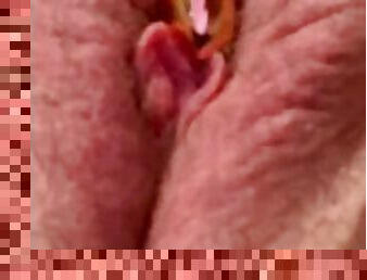 Close up vibrator on clit clamped with Bobby pin