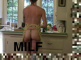 Smiley Blonde MILF in the kitchen