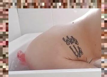 Teen Blonde Milf fucks herself in the bath with 8 inch pink dildo