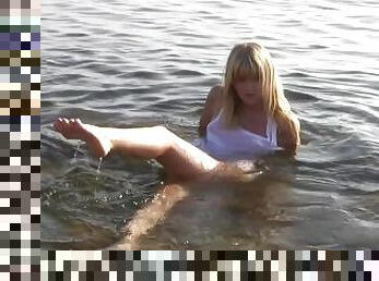 Divine Blonde Teen Blissfully Naked in the Sea