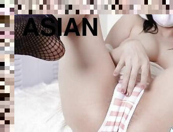 Cute Asian wear fishnet stockings squirting in your face