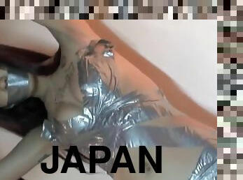 Japanese Girl Playing With Duct Tape