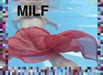 Hottest milf strips underwater