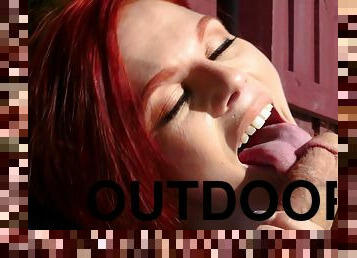 Redhead hottie Devyn Lux pleasures her lover outdoors