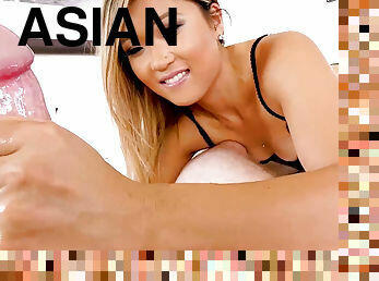 Glamorous blonde Asian Nyomi Star gags on a long white dick