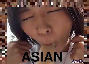 asian teenager rides dildo