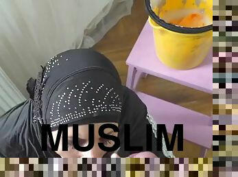 Hot Muslim woman doing extra cleaning