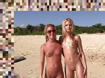 Lewd naked girls have fun on the beach
