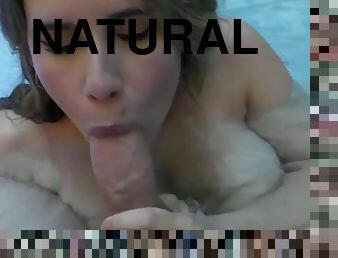 Beautiful naturally busty girl sucking big dick in pool - POV blowjob