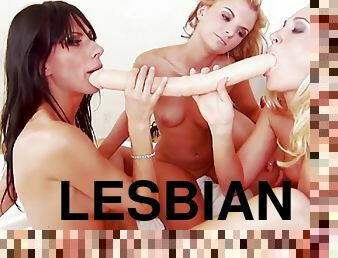 Wild lesbian trio play with double sided dildo in bed