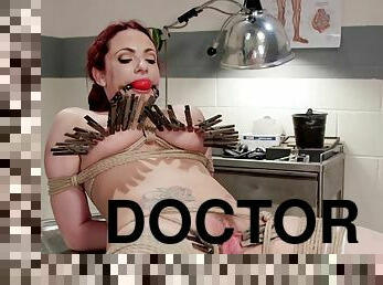 Nasty redhead doctor tied up and tormented
