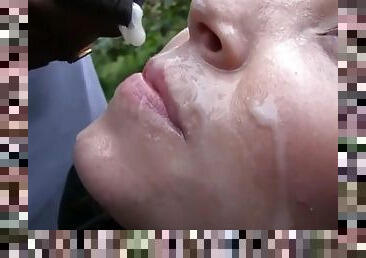 Readhead Amateur slut gets facial bukkake cumshots after oral gangbang outdoors