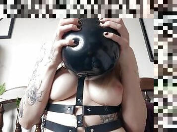 Goth Girl teases balloon blowing