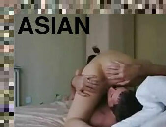 Asian milf nympho deepthroats cock