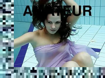 Dark haired Aneta in the pool